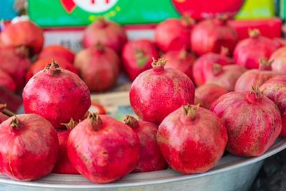 Local Uzbek pomegranates displayed at a market