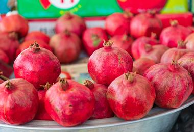 Local Uzbek pomegranates displayed at a market