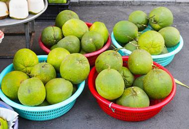 Vietnamese pomelo in baskets at a local market